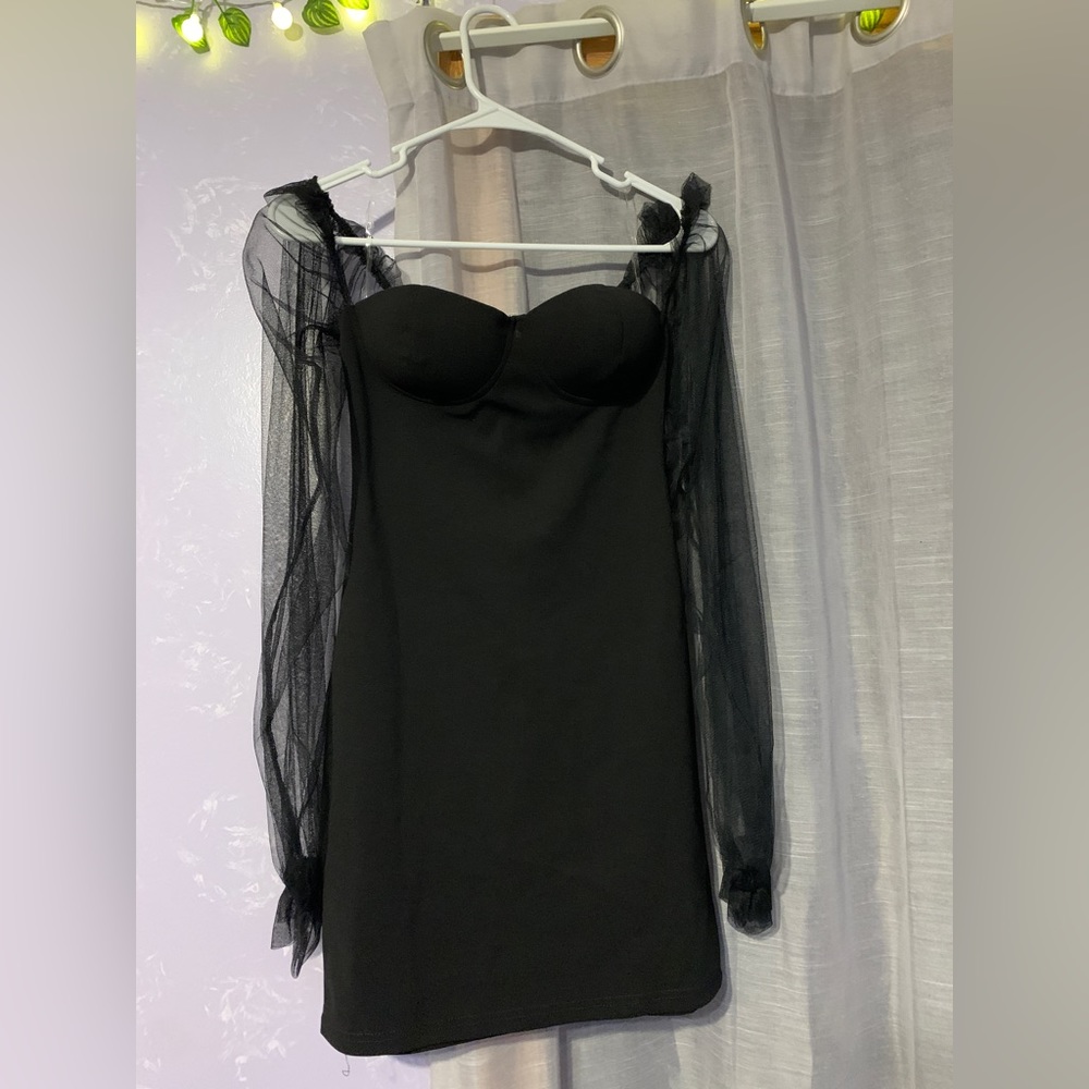 Sexy black dress with sheer sleeves